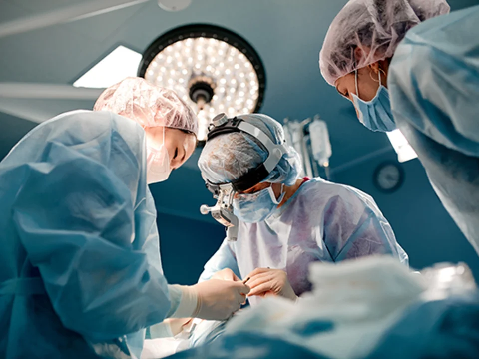Surgeons performing surgery